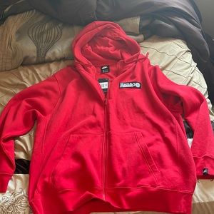 Brand new nike “just do it” hoodie. All around red and a zip up.
